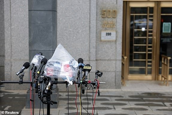 Microphones are set up outside the U.S. federal court, as the jury continues deliberations in the Sean "Diddy" Combs sex trafficking and racketeering conspiracy trial at U.S. federal court in Manhattan, New York City, U.S., July 2, 2025. REUTERS/Jeenah Moon