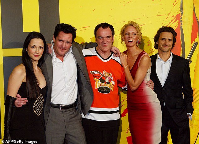 The star poses with Tarantino, actress Julie Dreyfus, Thurman and producer Lawrence Bender in 2003