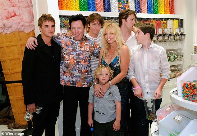 Hudson Madsen is pictured with his dad, Max Madsen, Luke Madsen, DeAnna Madsen, Christian Madsen and Kalvin Madsen in July 2011