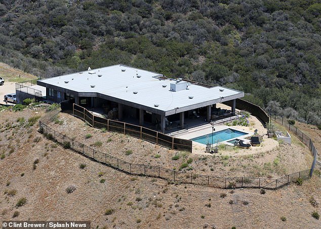 Hutchins was driving an ATV that 'plummeted 350 feet down into a ravine' after hitting a car near Jenner's clifftop Malibu mansion. Jenner's secluded $3.5M home in the canyons is seen here in file photo