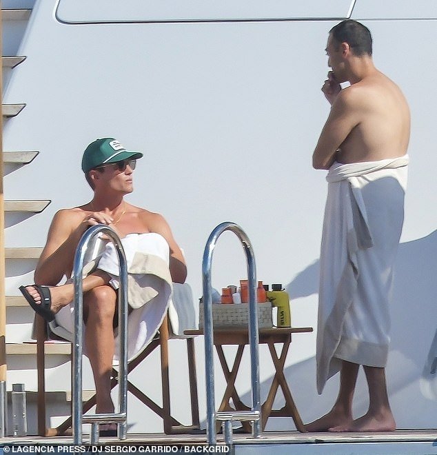 The NFL star was also seen talking to another guest on the yacht