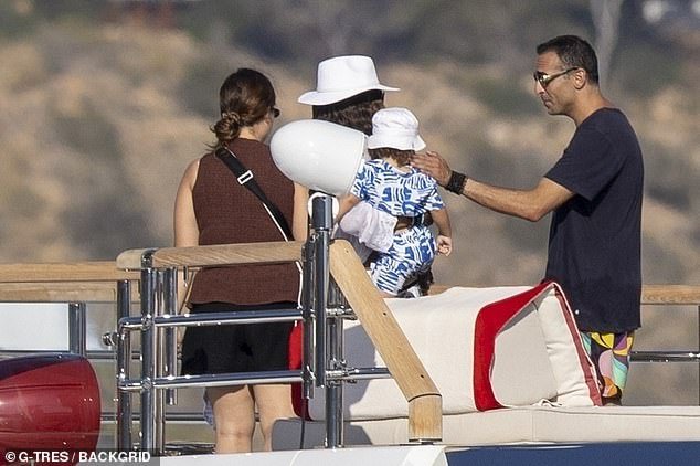 Naomi opted for a white bikini top as well as a pair of patterned bottoms for the fun outing
