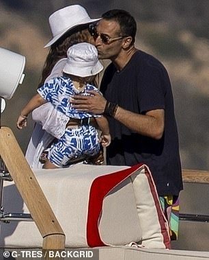 The beauty brought along her little one for the day on the water and was happily greeted by Mohammed