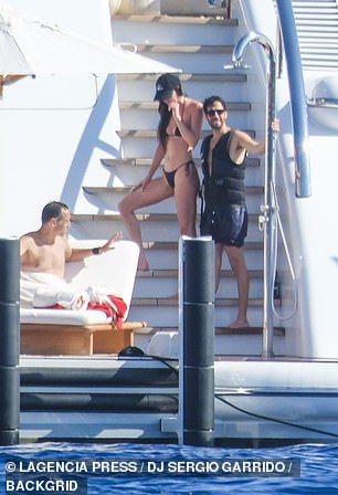 Earlier in the week, Dakota was also spotted having a blast in Ibiza - and was also seen mingling with a mystery man