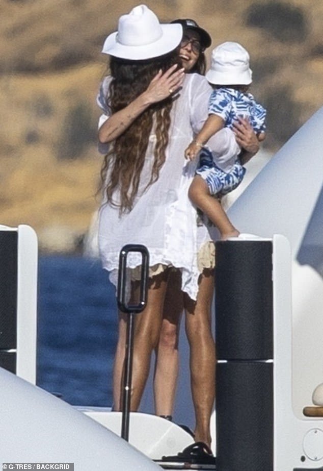 Campbell was also spotted sharing an embrace with Dakota as she made her way onto the yacht